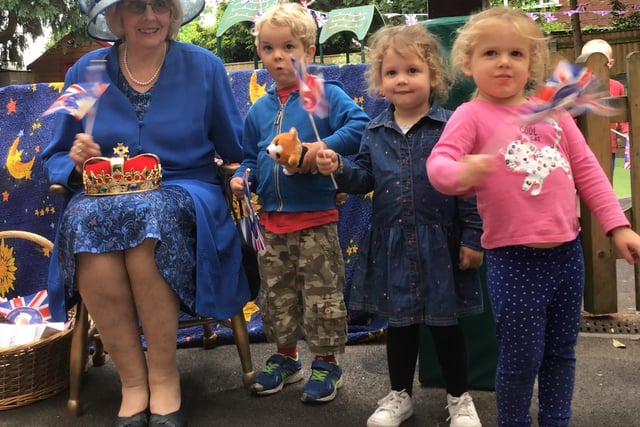The children at Castle Nursery and Preschool in Kenilworth had a very special visitor to celebrate the Platinum Jubilee - the 'Queen' herself! The children were shocked and excited when the Queen made a special appearance at their Jubilee party celebration. Her royal highness brought her crown to show the children, photos of her royal children and a corgi. The children made a golden throne for her to sit on, flags to wave, crowns to wear and flowers to give her. Castle's 'queen' was convincingly played by Pauline Weighell who set up the nursery 40 years ago but all of the children were convinced she was the real Queen! One child looked at her quizzically and said "you look a bit different to how you looked on telly yesterday!".