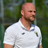 Boss Carl Adams has signed a contract with Rugby Town. Picture by Martin Pulley