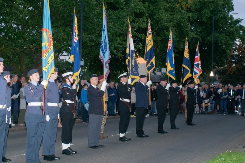 Presenting the colours at the moving service.