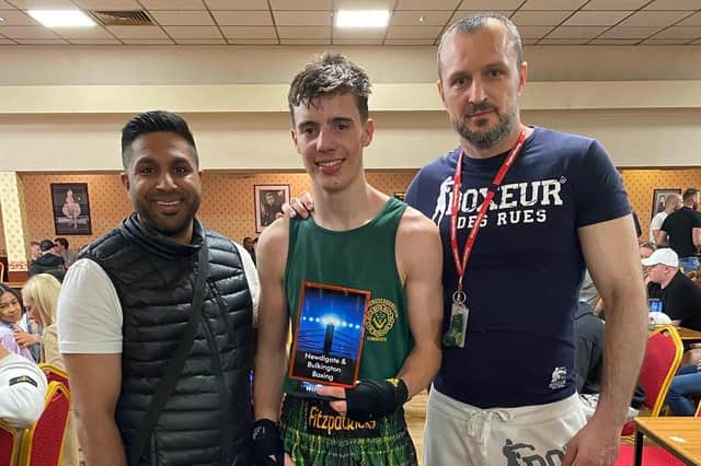 Henry Faizy with coaches Gage Singh and Marius Mikutzu