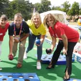 Shakespeare’s England digital marketing manager Darren Tosh, chief executive Helen Peters, content and digital marketing executive Sian Smith and business development manager Vicki Zamudio with John Cockcroft, chief executive of Bowls England (centre) at the Leamington Commonwealth Games festival site. Photo supplied