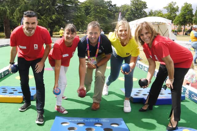 Shakespeare’s England digital marketing manager Darren Tosh, chief executive Helen Peters, content and digital marketing executive Sian Smith and business development manager Vicki Zamudio with John Cockcroft, chief executive of Bowls England (centre) at the Leamington Commonwealth Games festival site. Photo supplied