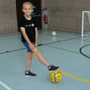 Yegor with his treasured new ball.
