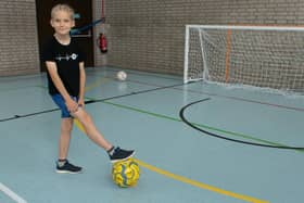 Yegor with his treasured new ball.