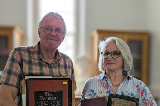 Project volunteer Steve Becker with Liz Pichon,, the Guildhouse Trustee leading the archive project.