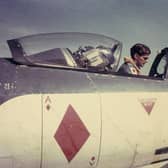 Lieutenant David Gunn RN carrying out preflight checks in a Seahawk fighter ground attack aircraft in the Mediterranean in 1958.