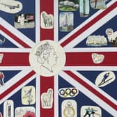 A special version of the Union flag commemorating various aspects of Queen's reign has been created by  members of the Kineton Art Group.