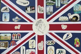A special version of the Union flag commemorating various aspects of Queen's reign has been created by  members of the Kineton Art Group.
