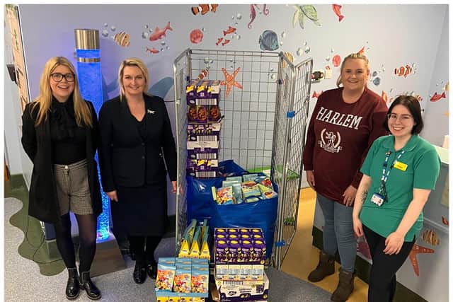 Left to right shows: Sarah Wallace and Alicia Churchill of HJ Dawson and WG Rathbone and Gemma Strain of Asda handing over the Easter eggs to Freya, a staff member at the children's ward at Warwick Hospital. Photo supplied