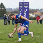 Leamington Fly-Half, James Dunne, is pictured scoring a fine individual try.
