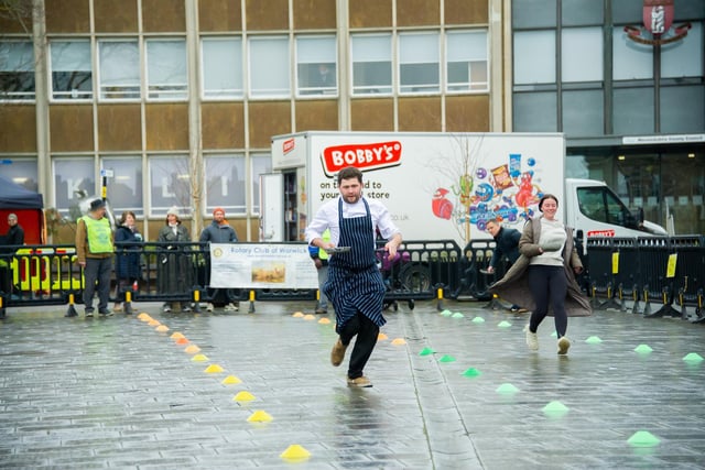 Warwick town centre, played host to the annual 'Pancake Race' this week.  Photo shows the adults' races.  Photo by Mike Baker