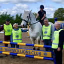 Members of the Warwick Lions Club visited the Lowlands Equestrian Centre in Shrewley to present a jump to mark the 55th anniversary of the Riding for the Disabled Association (RDA). Photo supplied