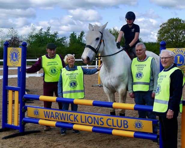Members of the Warwick Lions Club visited the Lowlands Equestrian Centre in Shrewley to present a jump to mark the 55th anniversary of the Riding for the Disabled Association (RDA). Photo supplied
