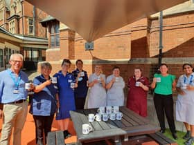 NHS heroes with their 'thank you' mugs.