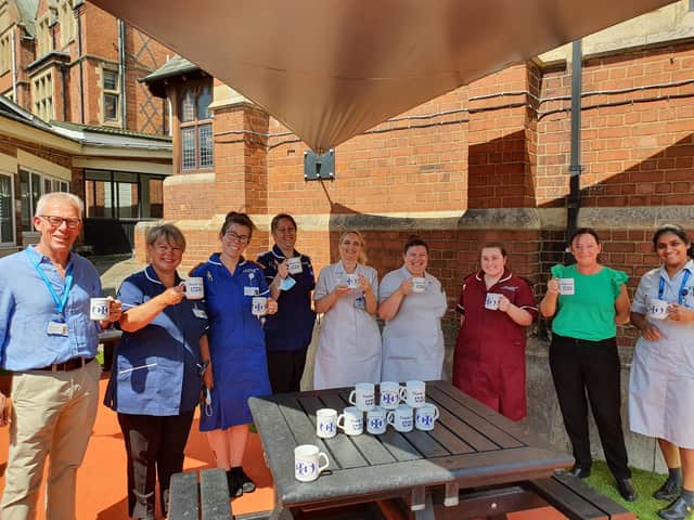 NHS heroes with their 'thank you' mugs.