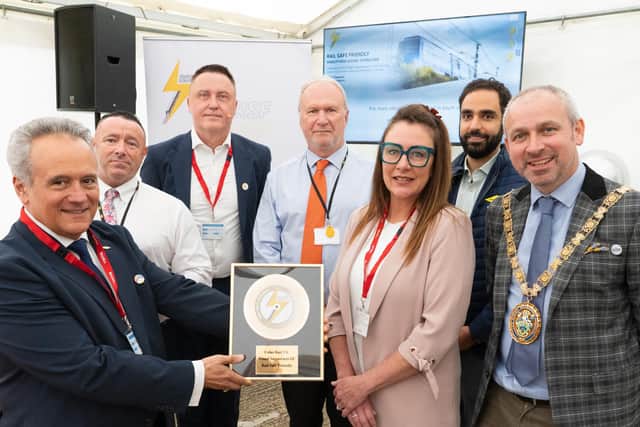 Mother of Harrison Ballantyne and Harrison’s Story campaigner, Liz Ballantyne, then left to right - Colas Rail UK CEO, Jean-Pierre Bertrand, Head of Plant Operations, Tony Birrell, Learn Live UK Managing Director, Stuart Heaton, Colas Rail UK Freight Director, Simon Ball, Colas Rail Head of Freight Operations, Sep Semsarzadeh and Rugby Mayor Simon Ward.