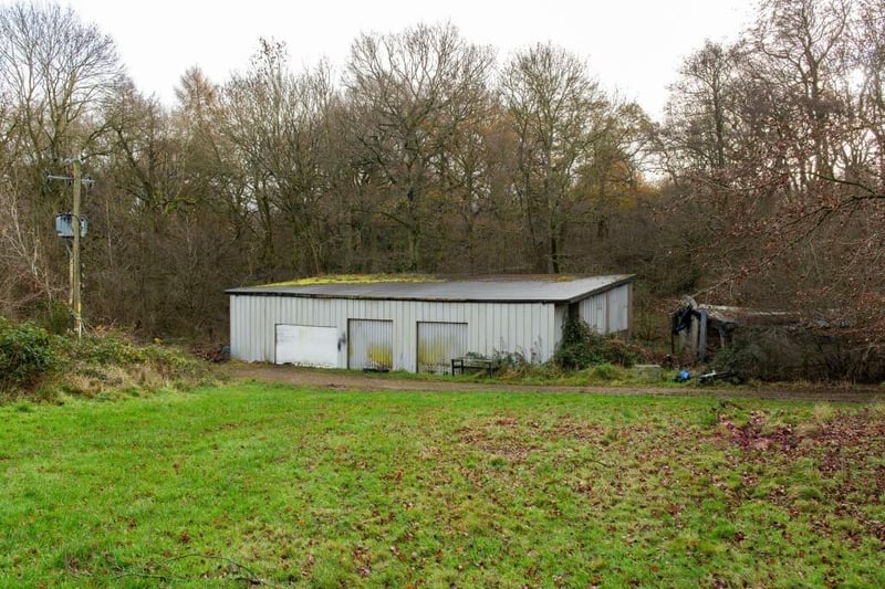 There are also outbuildings and stables at the property