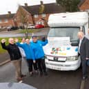 Newbold on Avon Community Partnership pictured in front of the community motorhome used to help distribute food following a £350 donation from Redrow Midlands