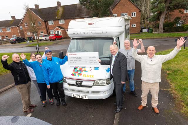 Newbold on Avon Community Partnership pictured in front of the community motorhome used to help distribute food following a £350 donation from Redrow Midlands