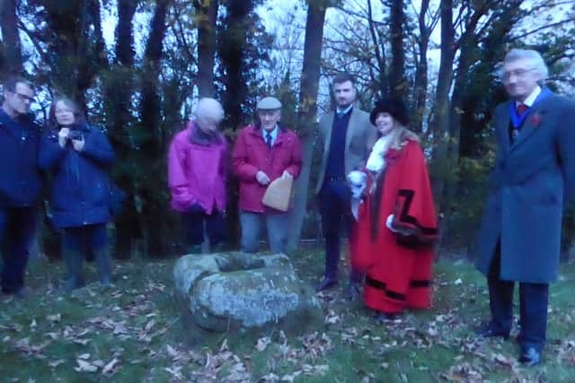 Ceremony-goers gather at first light.