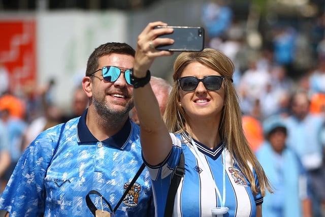 Fans arrive outside the stadium prior to the Sky Bet League Two Play Off Final between Coventry City and Exeter City at Wembley Stadium on May 28, 2018