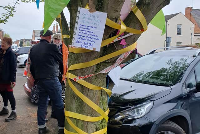 Harry Potter star David Bradley (wearing a flat cap and facing the camera) was among the Leamington residents protesting against the felling of the hornbeam tree in Farley Street, Leamington. Picture supplied.