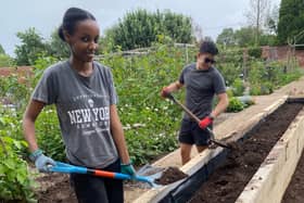 National Grid volunteers Michelle Nankunda and Ricky Lopez helping out at Guy's Cliffe Walled Garden in Warwick. Photo supplied