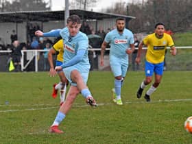Caine Elliott opened the scoring from the penalty spot but Rugby Town could only manage a 4-4 draw at GNG Oadby Town last weekend. Picture by Martin Pulley