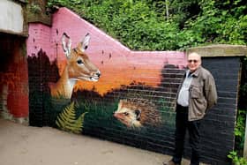 The Mayor of Warwick, Cllr David Skinner, next to one of the new mural sections.
