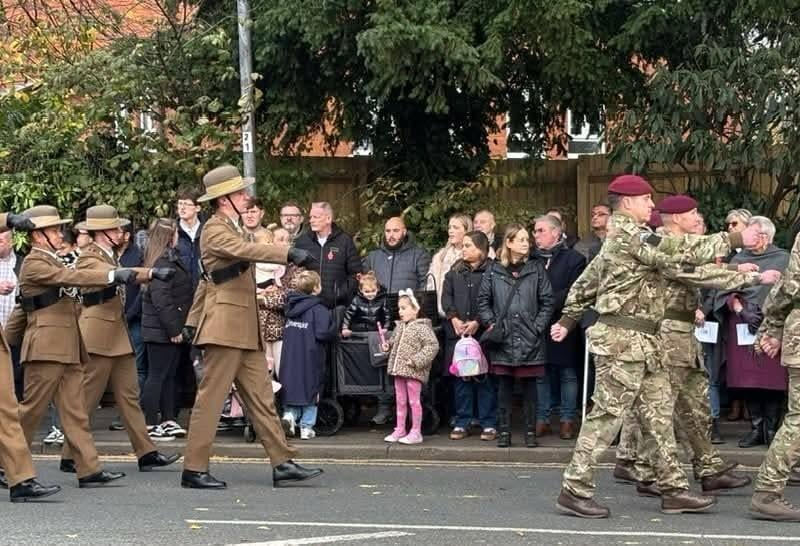 Crowds line the streets for the parade in Rugby.