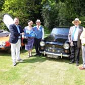 Mr Costa presents winners Mr and Mrs Maruda with the ‘Best in Show’ prize (left), alongside club president Roger Rose (right).