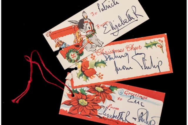 Christmas tags from royalty in Roland's collection. Photo by Mark Laban Hansons