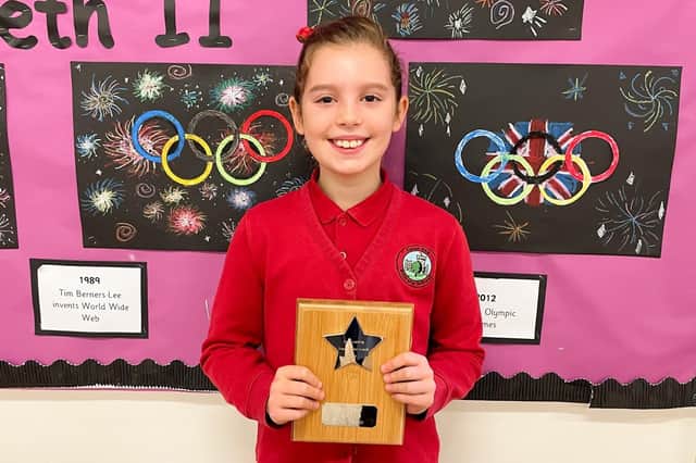 Eight-year-old Miki Baker of Coten End Primary School in Warwick, has won a prize in a writing competition. Photo supplied