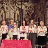 Rugby/Ukrainian Choir singing Ukrainian National Anthem.