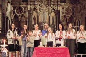 Rugby/Ukrainian Choir singing Ukrainian National Anthem.