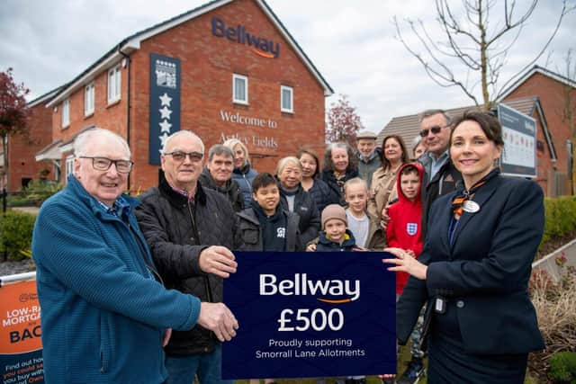 Bellway Sales Advisor Shirley Nichol with members from the Smorrall Lane Community Allotment Society