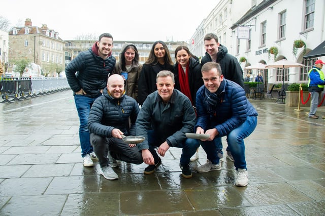 Warwick town centre, played host to the annual 'Pancake Race' this week.  With the winning adults race title being retained by 'The Globe'.  Pictured: Team Goodwill Ltd who went up against the team from The Globe. Photo by Mike Baker