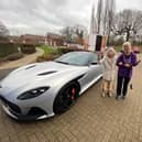 Meg Cottle (left) and her friend Sarah with the Aston Martin outside Harpers Fields care home in Balsall Common.