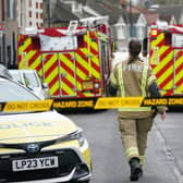 Firefighters outside a property on Sanderstead Road, Croydon, south London, where two men died and two more were left in a critical condition after a house fire on Friday evening. Picture date: Saturday December 30, 2023.