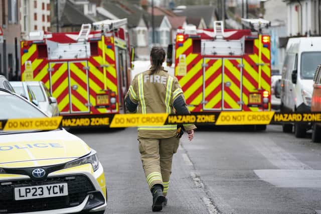 Firefighters outside a property on Sanderstead Road, Croydon, south London, where two men died and two more were left in a critical condition after a house fire on Friday evening. Picture date: Saturday December 30, 2023.