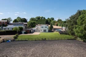 A view of the home and paddock.