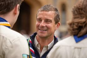 Chief Scout Bear Grylls talking with volunteers