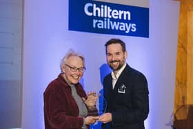 Michael Stewart, commercial and customer strategy director, presents the award to Marianne Pitts from the Friends of Leamington Station.