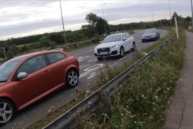 This driver of this white car was fined £200 and received 6 points on their licence after footage showing them on their phone on the A46 near Ansty M6 J2 on 23 August 2023 was submitted to Op Snap.