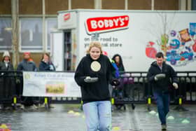 Warwick town centre, played host to the annual 'Pancake Race' this week.  Photo shows the adults' races.  Photo by Mike Baker
