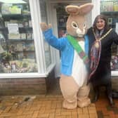 Rugby Mayor Maggie O'Rourke with Peter Rabbit outside Hunts Bookshop.