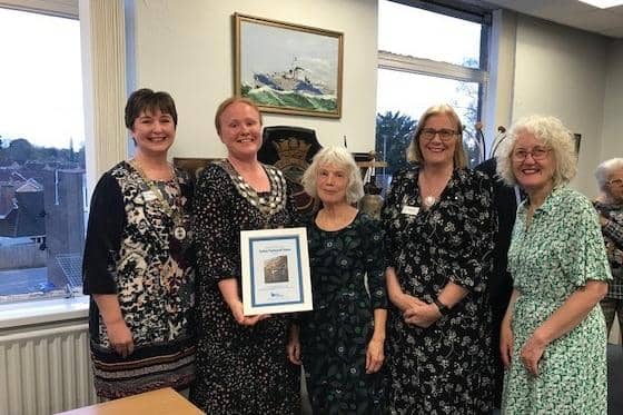 The photo shows the presentation of the certificate. From left to right: Amanda Jones, President of Kenilworth Soroptimists; Sam Louden-Cooke, Town Mayor; Wendy Edwards, local Toilet Twinning representative; Elaine Clarke and Sharon Maxted, Kenilworth Soroptimists. Picture supplied.