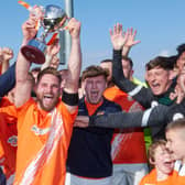 Rugby Borough celebrate their play-off win, which means they will be playing at Step 5 next season