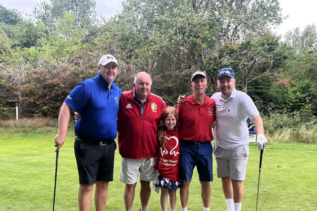 Pete (left) and Dave (right) with Paul's dad Tony, daughter Emelia and stepdad Paul.