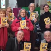 Writers with their new book.